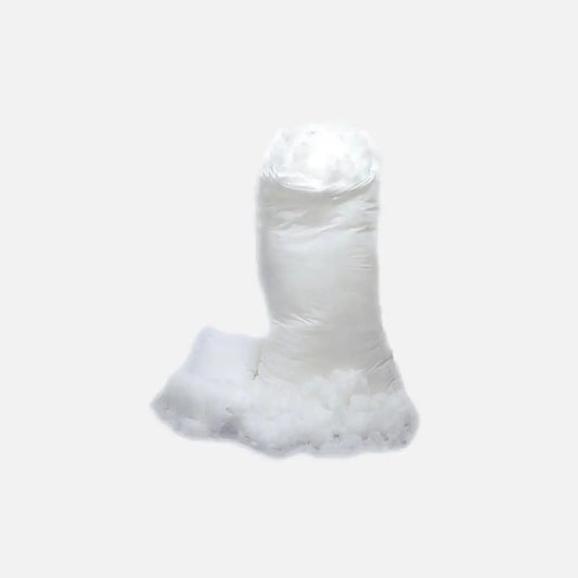 A bundle of loose white fibre padding material.
